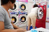 Erotic image of a big ass married woman seducing at a laundromat