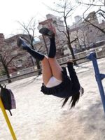 Panchira image of park playground equipment playing with iron bars and swings
