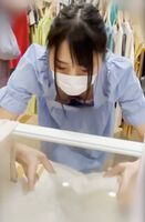 Female clerk breasts flickering image slouching