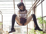 Erotic image with bondage M-shaped legs open with a snap
