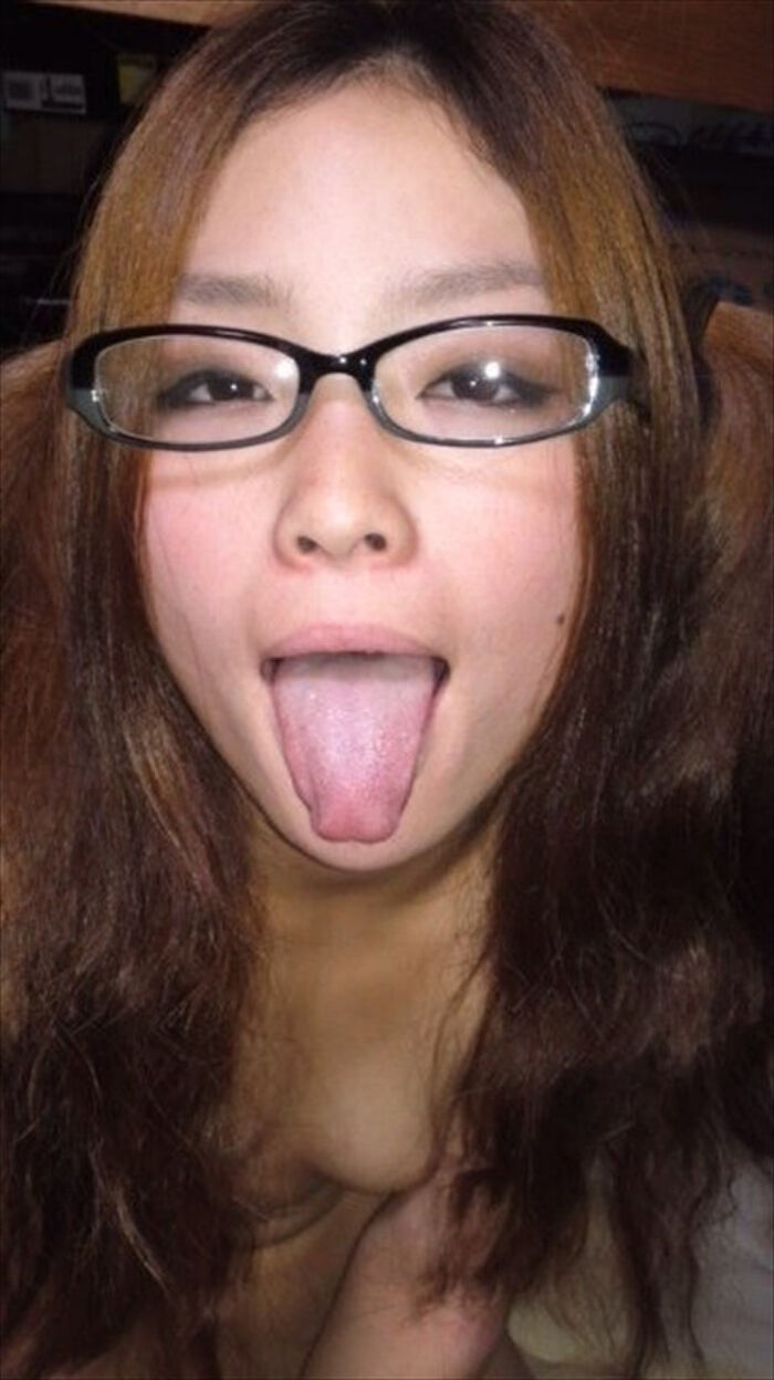 Selfie image of a girl with glasses 14th image