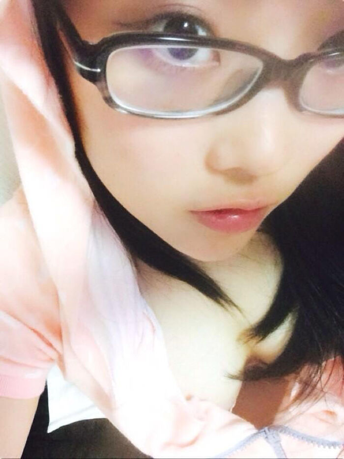 Selfie image of a girl with glasses 83th image