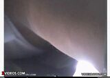 Low angle voyeur of high school girl on train