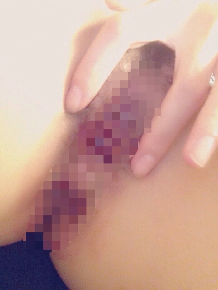 Beautiful leg slender lying on bed in leopard print pants takes a selfie 10th image