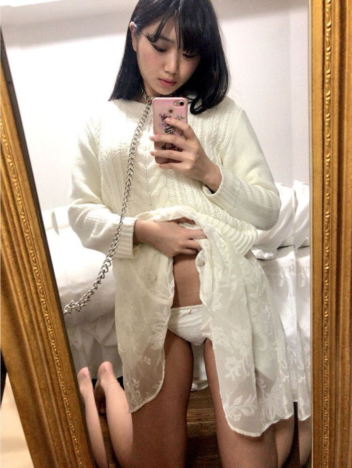 Selfie erotic image showing the inside of the skirt 4th image