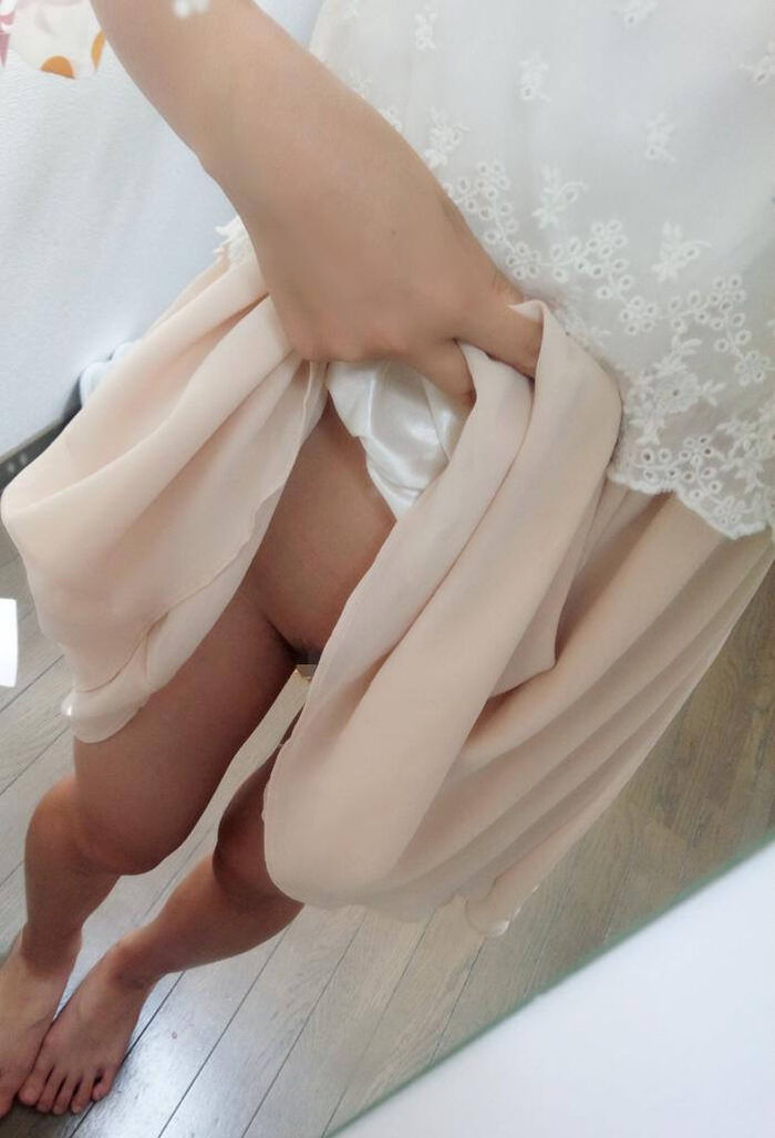 Selfie erotic image showing the inside of the skirt 7th image