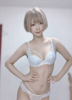 Erotic images of décolleté macaroni cord bra