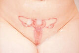 Dirty print tattoo erotic image with uterine design
