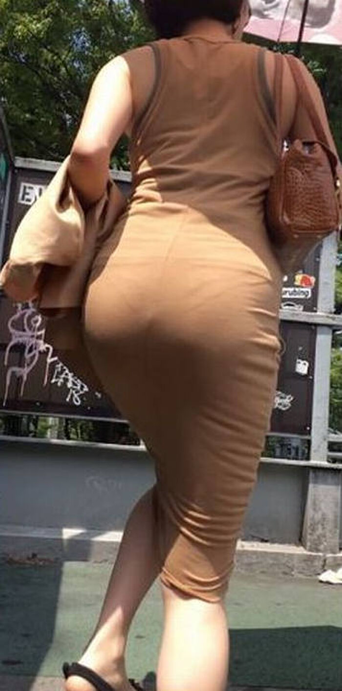 Erotic image of the buttocks with the panty line visible 10th image