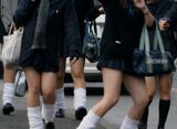 - A little short skirt exposes bare legs! No matter how cold it is, a city shot image of a high school girl doing her best to attract a man's attention