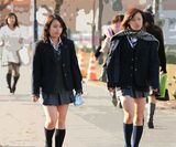 I'm sure this year's freshmen will soon have shorter skirts ww city shooting JK exposing her thighs to the limit in a blazer and miniskirt!