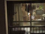 It's a crime, but I can't stop ... A private house voyeur image that excites a woman's naked private life peeking through the window of a private house