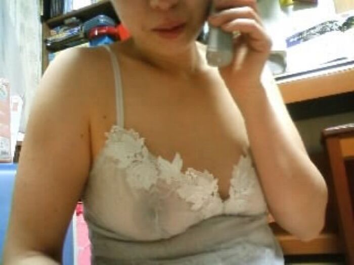 Erotic image of a mature woman wearing a lightly dressed no-bra camisole aunt 10th image