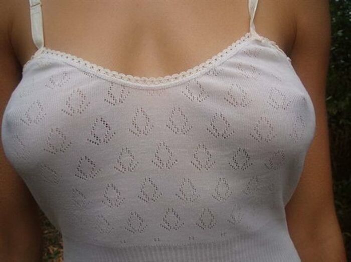 Erotic image of a mature woman wearing a lightly dressed no-bra camisole aunt 14th image