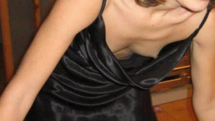 Erotic image of a mature woman wearing a lightly dressed no-bra camisole aunt 26th image