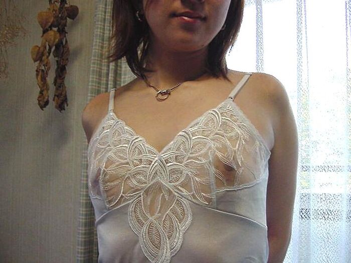 Erotic image of a mature woman wearing a lightly dressed no-bra camisole aunt 3th image