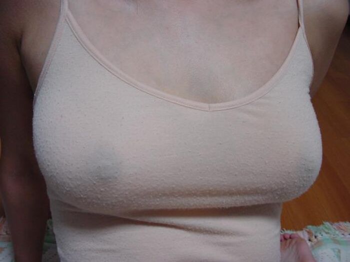 Erotic image of a mature woman wearing a lightly dressed no-bra camisole aunt 5th image