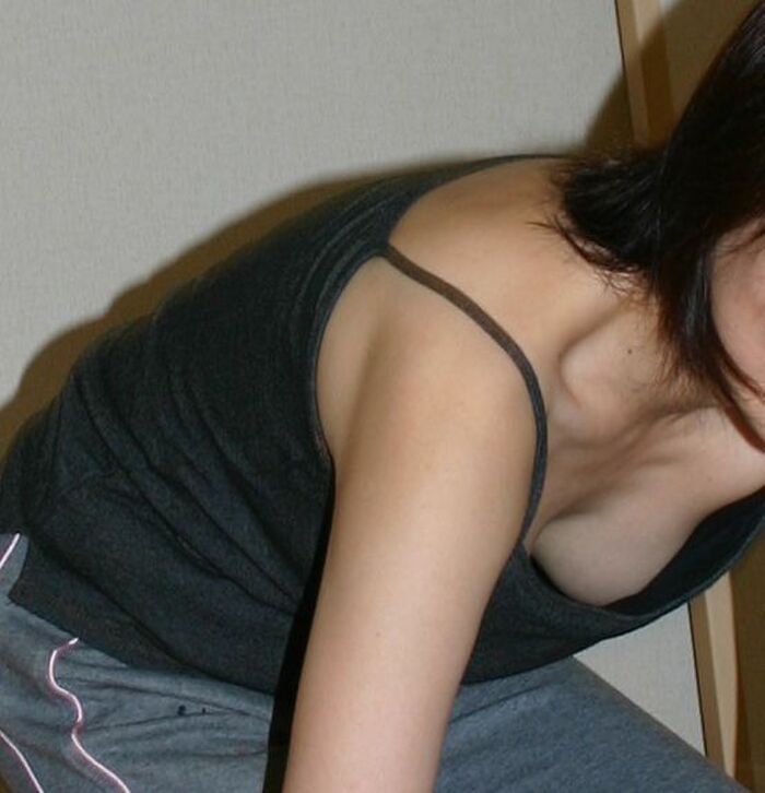 Erotic image of a mature woman wearing a lightly dressed no-bra camisole aunt 9th image