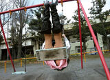 Erotic images of buttocks flickering on a swing and buttocks bare