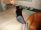 Erotic image of a clothed mature woman who had messy sex with her aunt at a love hotel