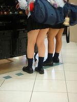 64 JK knee back voyeur images ~ Slippery raw footwork of a uniform high school girl taken in the city