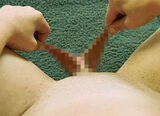 Erotic image of a villa villa bjorn pulling and stretching the labia minora