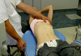 Erotic image of an internal medicine doctor who is busy examining boobs