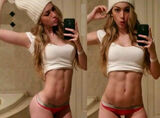 Selfie image of a foreign beauty with beautiful abdominal muscles