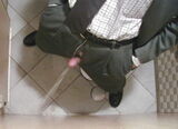 erotic image of a boy peeing while standing