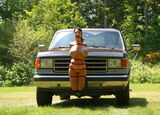 Erotic images crucified in cars or confined in trunks and cargo beds