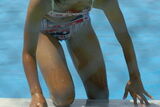 Erotic images of bikinis, swimsuits, and swimsuits going up to the poolside
