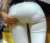 66 skinny pants erotic images Clearly clothed ass voyeur with a clear silhouette of bread lines and buttocks
