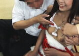Erotic image of Mr./Ms. cosplay giving boobs as a gift