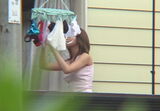Veranda voyeur! Erotic images of women hanging underwear and laundry
