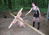Crucified in the open air! Erotic image of a naked foreigner crucified