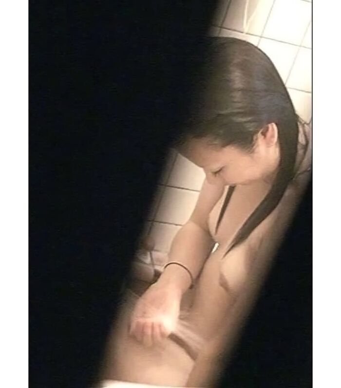 Voyeur of a girl's erotic nakedness from the gap in the window in the bath of a private house 27th image