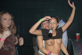 A young girl makes a fuss with her boobs out! Drunk foreigner goofy erotic images