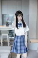 XiuRen Issue 6993_Model Lin Youyou in a white top paired with a plaid short skirt, showing off light-colored lingerie, showing off her graceful figure in a seductive photoshoot 103P